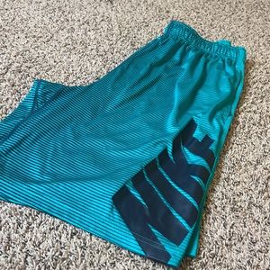 NIKE dri-fit athletic shorts.